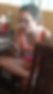 Chubby Girl in Glasses Sitting Cross-Legged With Her Phone Cafe Creepshot