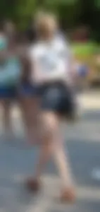 Skinny blonde chick in little denim shorts