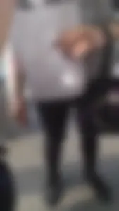 Girl wearing a black skirt over her leggings