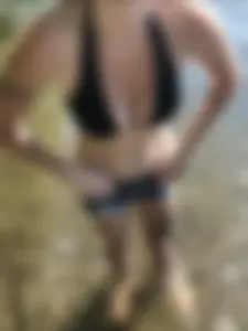 Someones girlfriend with nice tits in black bikini top and shorts