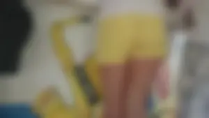 Milf in yellow shorts with vpl and a wedgie