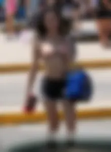 Girls in bikinis getting ready for tubing