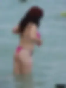 Beach voyeur girls in bikinis, thongs and topless