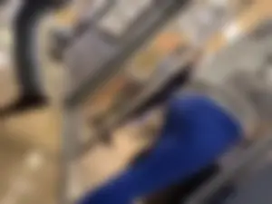 Thick girl waiting in line with blue leggings (OC)