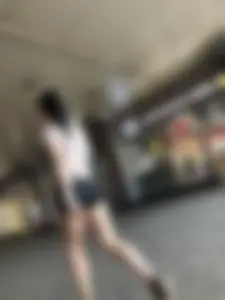 Awesome candid chick wearing mini shorts, perfect long pale legs