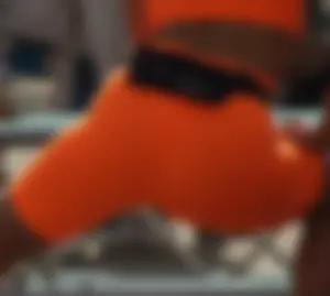 Athlete in Orange Spandex Outfit Stretching Legs VPL Candid Photos