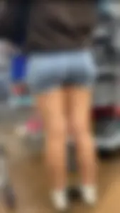 Cutie in shorts. Lil booty sits nicely