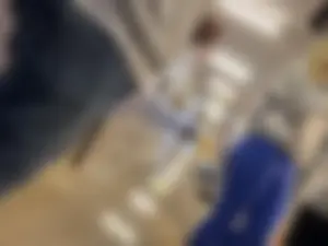 Thick girl waiting in line with blue leggings (OC)