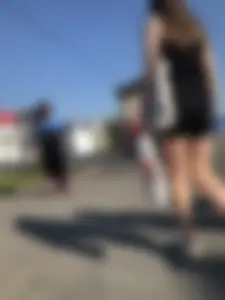 Nice Girl in Black Shorts And Sneakers Street Candid Gallery