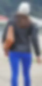 Cute girl with a nice ass in tight blue leggings along the water in San Fran