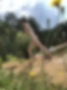 Tall Girl in Swimsuit Walking on a Beach Photos