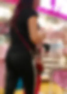 Mature sexy lady in Pink leggings shopping at Pink