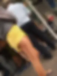 Skinny ass eating her yellow shorts