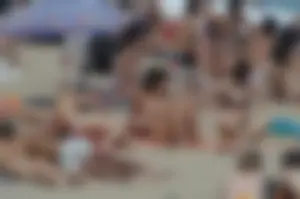 Topless girls on a beach in Barcelona