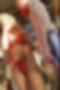 Blonde with crazy jiggly bubble in red bikini