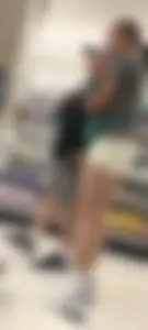 Amazing Asian in white yoga shorts upshot bends squat at Target