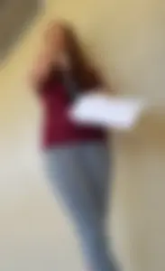 College student in grey leggings almost with camel toe showing