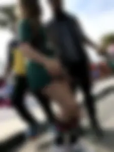 Teen girls in uniform - shorts, knee socks and fishnet pantyhose street creepshots