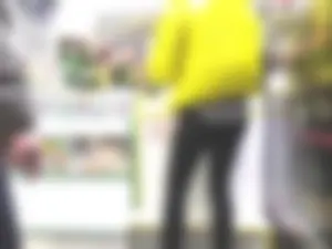 Legs in Leather Pants at the Store Closeup Photos