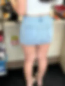 Sexy white girl in mini skirt beautiful legs