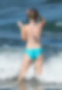 Another sexy girl on the beach snorkeling