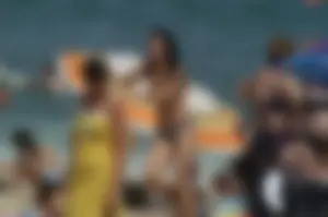 Topless girls on a beach in Barcelona