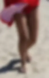 Candid beach Asian with a sexy little ass in a red swimsuit