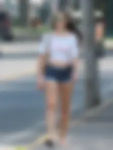 Denim short babe with a wedgie showing some cheeks