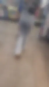 Girl in tight jeans bends over in front of me
