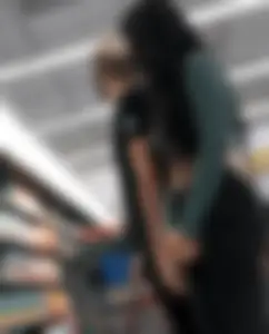 Tight green top and blk jeans at the market