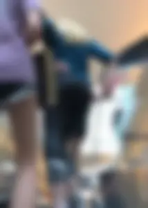 Blonde at the mall in leggings with a nice ass