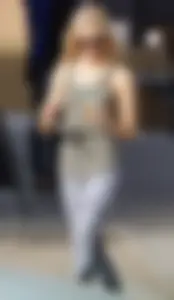 Hot blonde in light leggings after getting Starbucks