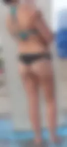Beach shower milf in semi thong bikini with a nice ass