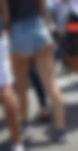 Thick booty babe in denim shorts showing her cheeks