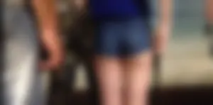Skinny booty in mini-shorts, butt cheeks closeup and nice bare legs