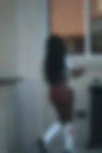Sexy ebony Tilted Kilt employee in her uniform