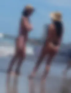 2 milfs in thong bikinis on the beach