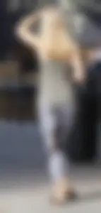 Hot blonde in light leggings after getting Starbucks