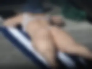 Sexy thick neighbor caught getting some sun in a little bikini showing of her chunky ass