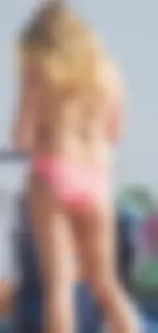 Thick blonde bikini babe on the beach