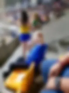 Owner of Sexycandidgirls.top Taking a Photo of a Hot Girl’s Booty in Shorts at the Stadium