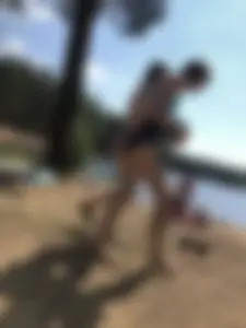 Wet Girls in Swimsuits Walking Towards Water at a Lake Beach Photo Series