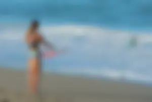 Candid surfers in bikinis