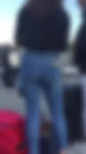 Teen in jeans pants bend over