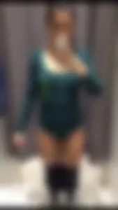 Girl with Her Pants Pulled Down in Tights Fitting Room Mirror Selfie
