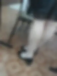 Teen in Skirt on High Heels Standing in Classroom Candid Photos