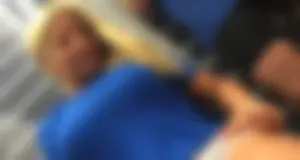 Blonde lady with big boobs showing pokies