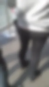 Girl wearing a black skirt over her leggings