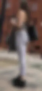 Sexy girl in see through grey leggings showing her thong