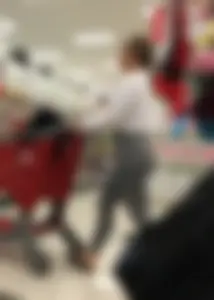 Sexy lady shopping at Target with a big ass in grey leggings